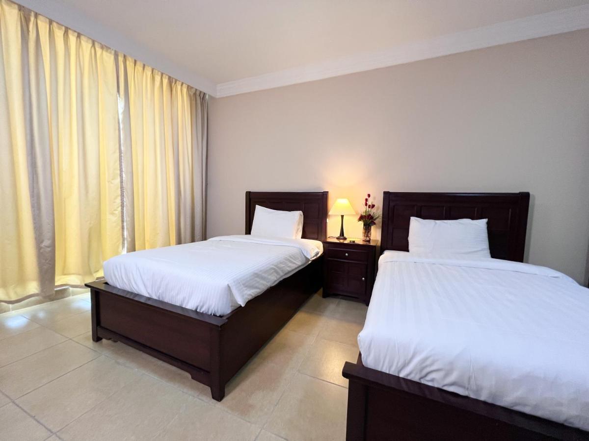Amt Mena Aparthotel Doha Exterior foto