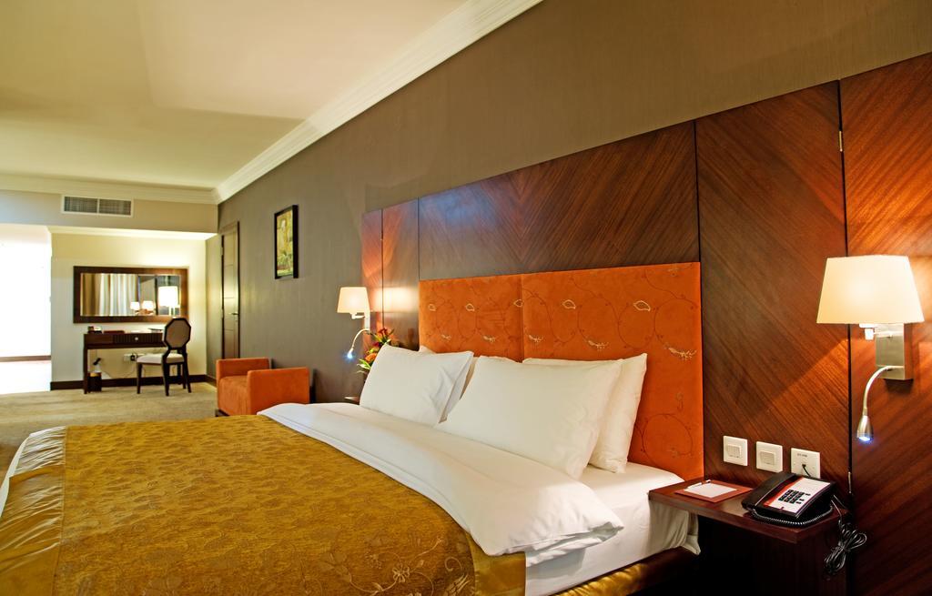 Amt Mena Aparthotel Doha Quarto foto